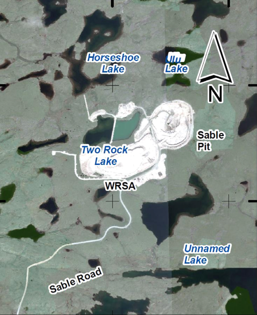 Two Rock Sedimentation Pond and other mining installations viewed from above. - Description below